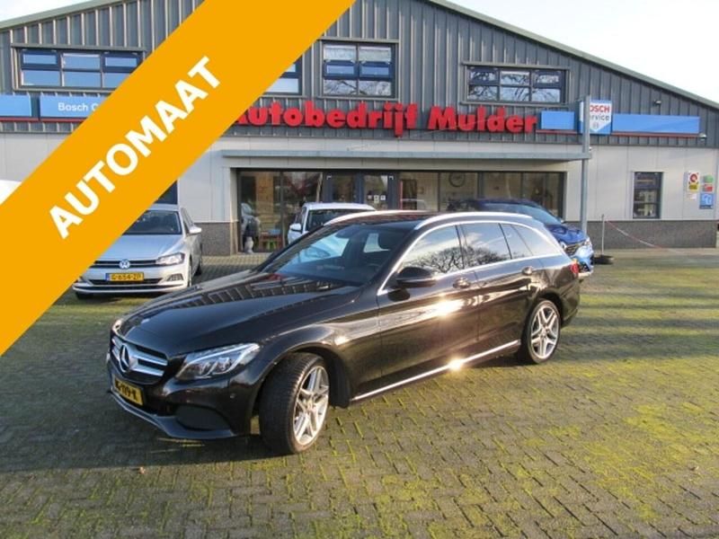 Zwart (metallic) Occasion 2015 Mercedes C350e Stationwagen | € 10.489 (Eerlijke prijs) - Afbeelding 1/4