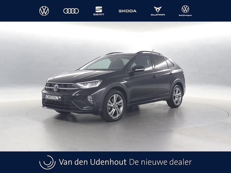 Zwart Gebruikt 2022 VW Taigo R-line SUV | € 23.940 (Eerlijke prijs) - Afbeelding 1/3