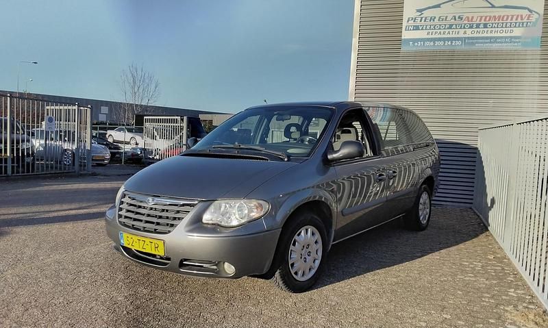 Grijs (metallic) Gebruikt 2007 Chrysler Grand Voyager MPV | € 5.250 - Afbeelding 1/4