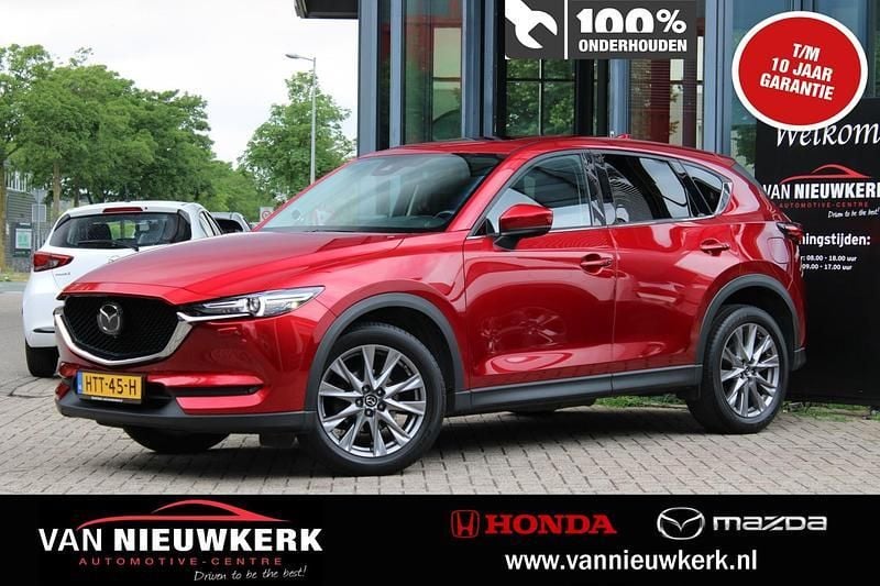 Soul red chrysthal (rood metallic) Gebruikt 2021 Mazda CX-5 Luxury SUV | € 32.700 (Eerlijke prijs) - Afbeelding 1/4