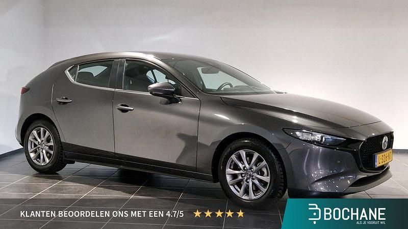 Grijs Gebruikt 2021 Mazda 3 Comfort Hatchback | € 21.740 (Eerlijke prijs) - Afbeelding 1/4