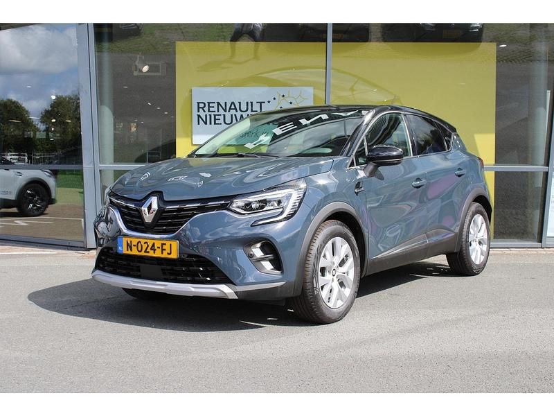 Occasion Renault Captur Intens 101 PK (74 kW) 2021 Twotone bleu marine / noir et SUV