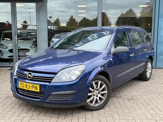 Blauw Gebruikt 2005 Opel Astra Essentia Stationwagen | € 1.250 (Eerlijke prijs) - Afbeelding 1/4