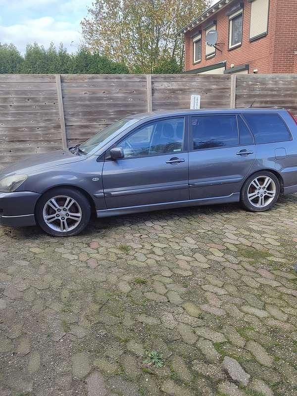 Grijs Gebruikt 2007 Mitsubishi Lancer Intense Stationwagen | € 1.150 (Super prijs) - Afbeelding 1/4