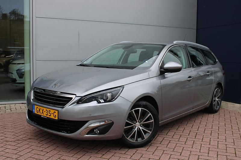 Grijs Gebruikt 2016 Peugeot 308 Allure Stationwagen | € 9.400 (Eerlijke prijs) - Afbeelding 1/4