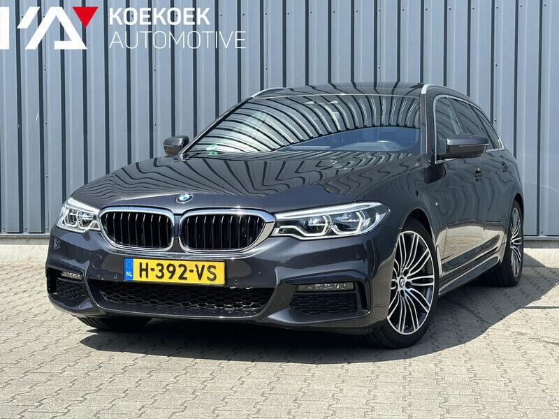 Grijs Gebruikt 2020 BMW 520 Executive Stationwagen | € 34.145 (Eerlijke prijs) - Afbeelding 1/4