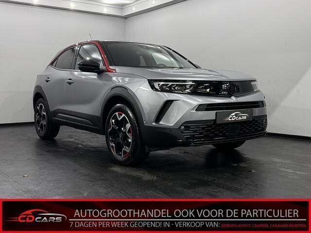 Grijs Gebruikt 2024 Opel Mokka GS Line SUV | € 27.950 (Eerlijke prijs) - Afbeelding 1/4