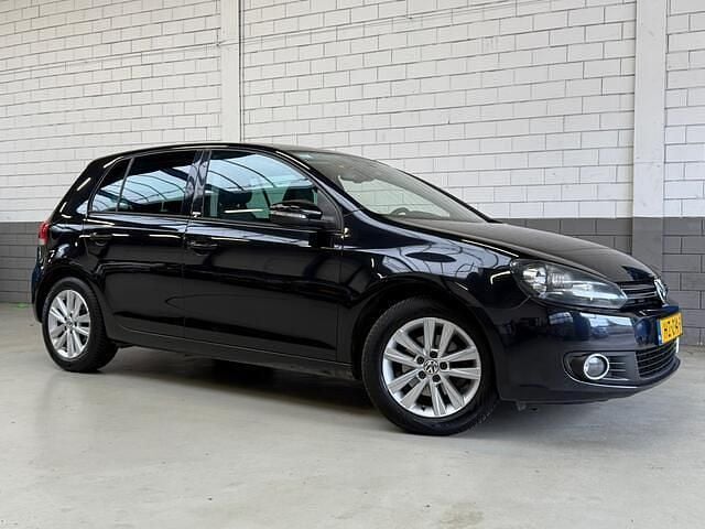 Zwart Gebruikt 2012 VW Golf VII Highline Hatchback | € 7.250 (Goede deal) - Afbeelding 1/4