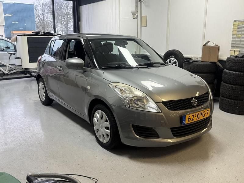 Grijs Occasion 2012 Suzuki Swift Hatchback | € 5.950 (Eerlijke prijs) - Afbeelding 1/4
