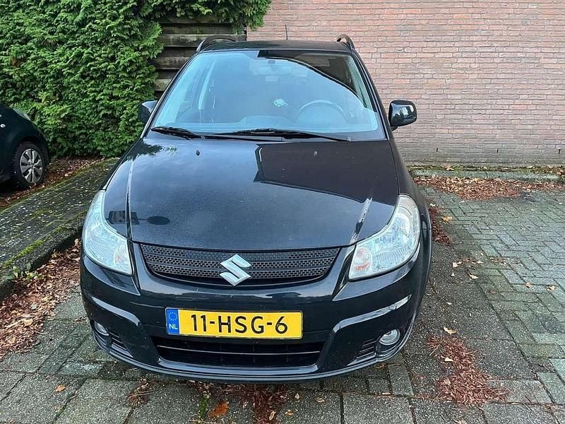 Zwart Gebruikt 2009 Suzuki SX4 Hatchback | € 6.400 (Eerlijke prijs) - Afbeelding 1/4