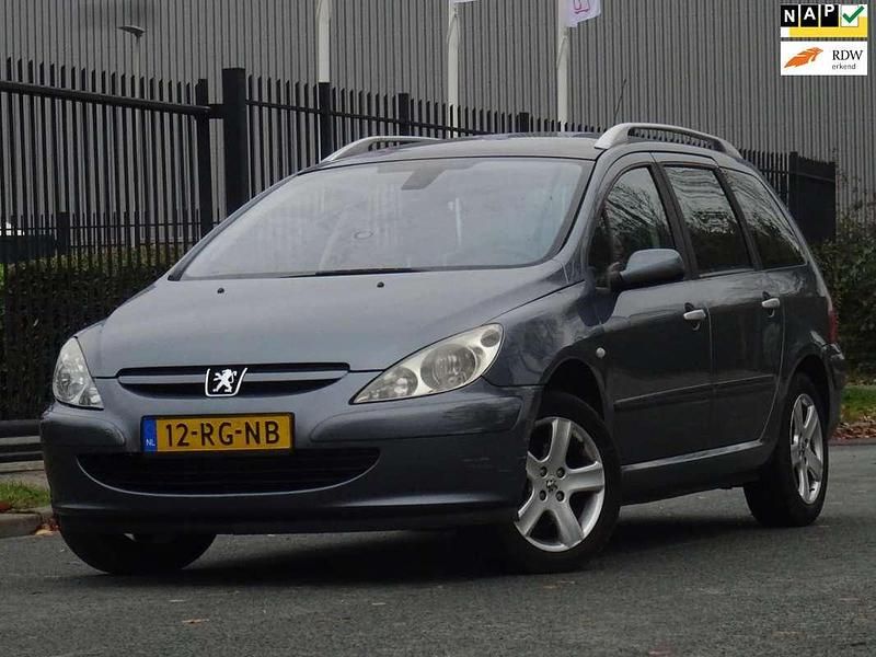 Grijs Gebruikt 2005 Peugeot 307 Premium Stationwagen | € 1.499 (Eerlijke prijs) - Afbeelding 1/4