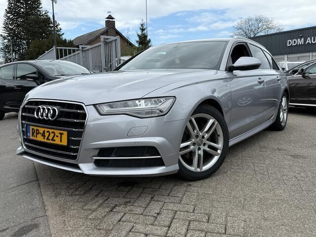 Grijs, metallic lak Gebruikt 2018 Audi A6 S-Line Stationwagen | € 13.950 - Afbeelding 1/4