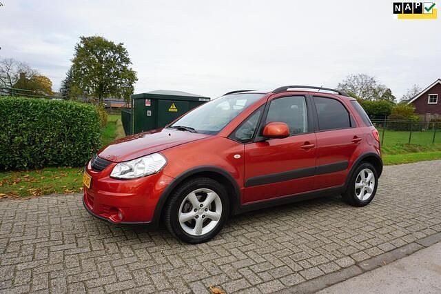 Oranje Gebruikt 2007 Suzuki SX4 MPV | € 2.850 (Eerlijke prijs) - Afbeelding 1/4