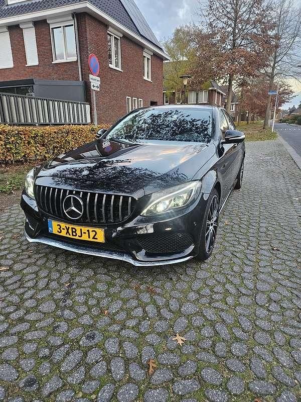 Zwart Occasion 2014 Mercedes C200 Prestige Sedan | € 18.000 (Iets duurder) - Afbeelding 1/4