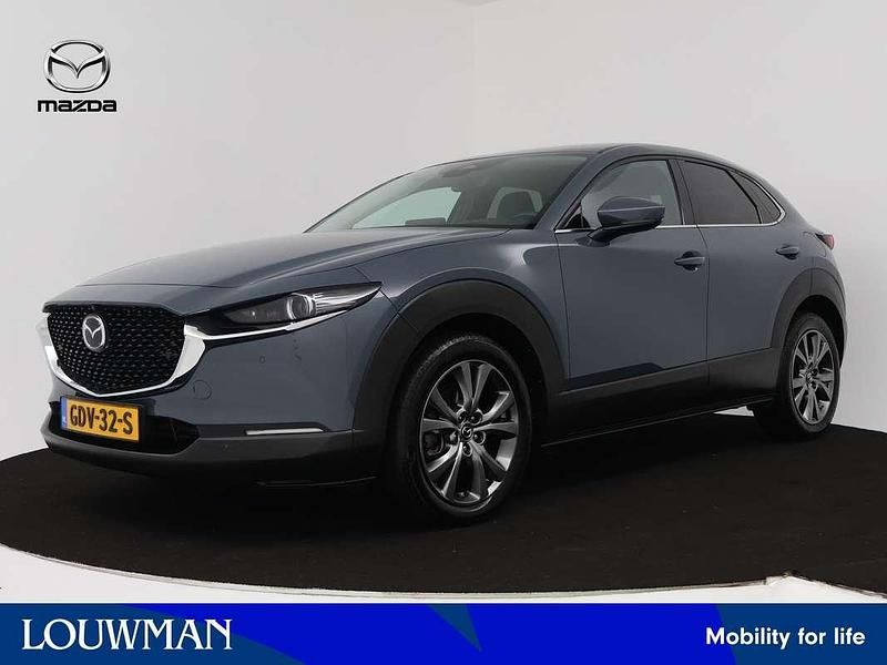 Polymetal gray (grijs metallic) Gebruikt 2024 Mazda CX-30 Exclusive-Line SUV | € 38.945 (Duur) - Afbeelding 1/3