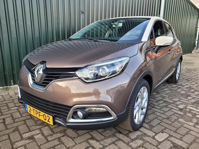 Bruin (metallic) Gebruikt 2014 Renault Captur Dynamique SUV | € 7.890 (Goede deal) - Afbeelding 1/4