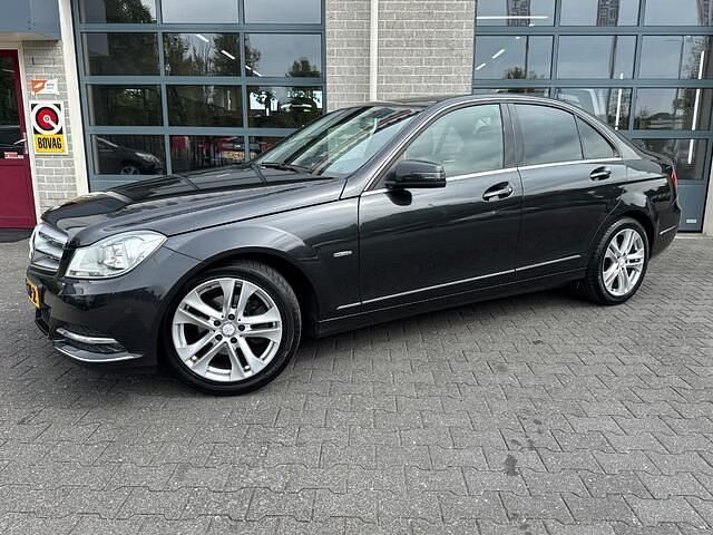Zwart Gebruikt 2012 Mercedes C180 Business Sedan | € 11.850 (Eerlijke prijs) - Afbeelding 1/4