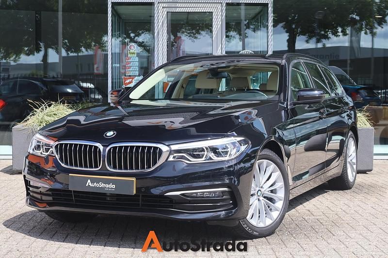 Zwart Gebruikt 2020 BMW 520 Executive Stationwagen | € 28.900 (Super prijs) - Afbeelding 1/4
