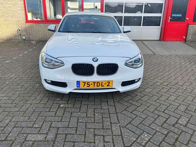 Wit Gebruikt 2012 BMW 116 Hatchback | € 8.500 (Duur) - Afbeelding 1/4