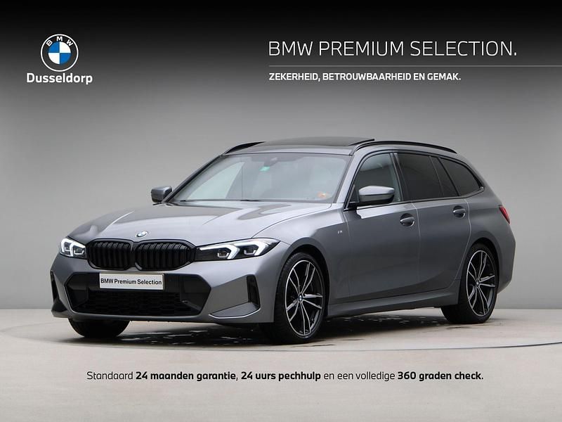 Skyscraper grey metallic (grijs metallic) Gebruikt 2024 BMW 318 Shadowline Stationwagen | € 43.950 (Duur) - Afbeelding 1/4