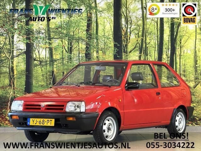 Rood Gebruikt 1990 Nissan Micra Hatchback | € 3.795 - Afbeelding 1/4