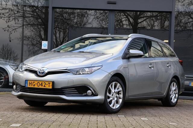 Grijs Gebruikt 2015 Toyota Auris Touring Sports Stationwagen | € 11.445 (Eerlijke prijs) - Afbeelding 1/4