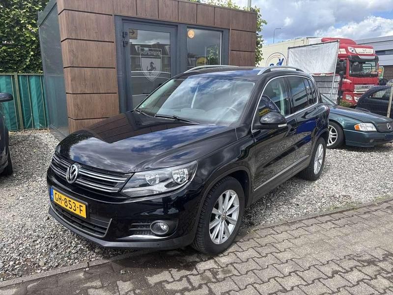 Zwart Gebruikt 2015 VW Tiguan Sport SUV | € 13.940 (Eerlijke prijs) - Afbeelding 1/4
