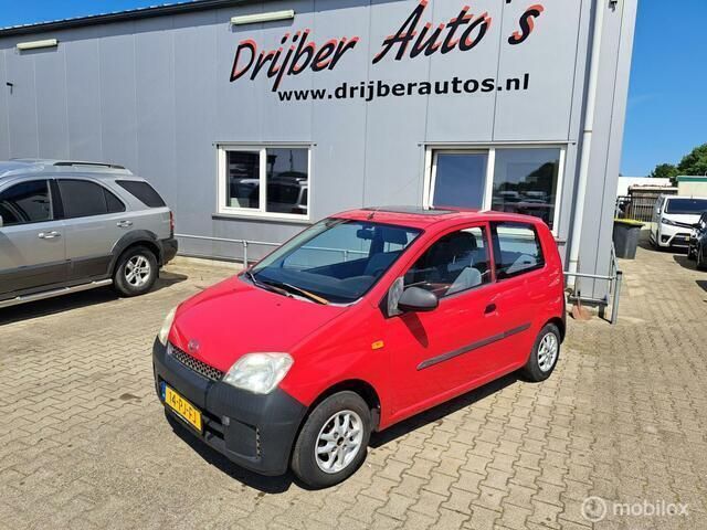 Rood Gebruikt 2004 Daihatsu Cuore Hatchback | € 550 (Super prijs) - Afbeelding 1/4