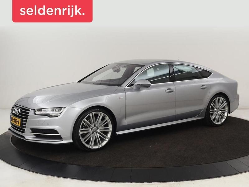 Grijs (metallic) Gebruikt 2016 Audi A7 Sportback Proline Hatchback | € 21.900 - Afbeelding 1/4
