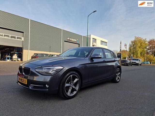 Grijs Gebruikt 2012 BMW 116 Hatchback | € 4.650 (Goede deal) - Afbeelding 1/4