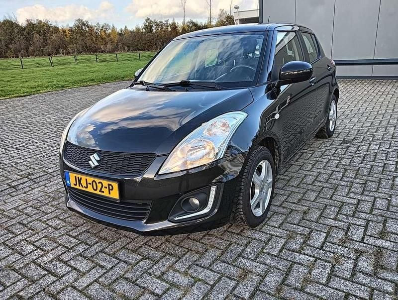 Zwart Gebruikt 2016 Suzuki Swift Comfort Hatchback | € 7.350 (Eerlijke prijs) - Afbeelding 1/4