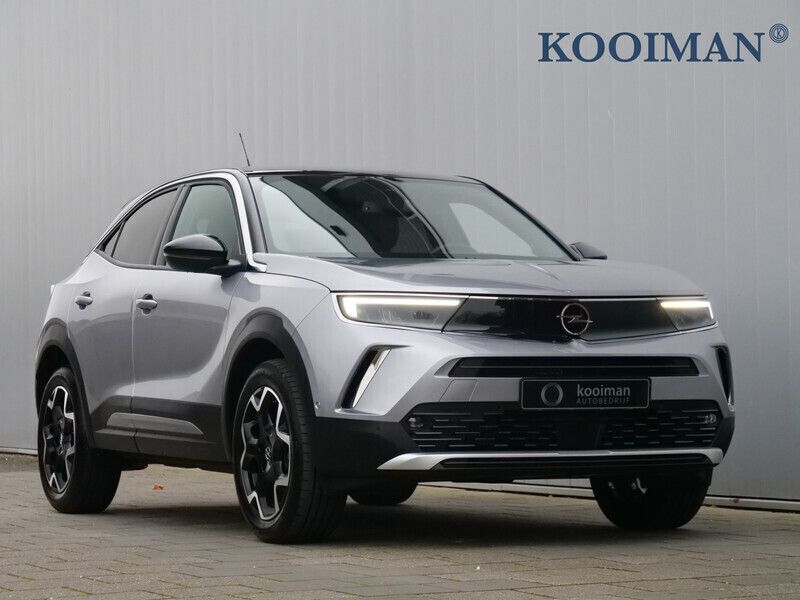 Grijs Gebruikt 2023 Opel Mokka Ultimate SUV | € 24.995 (Eerlijke prijs) - Afbeelding 1/4