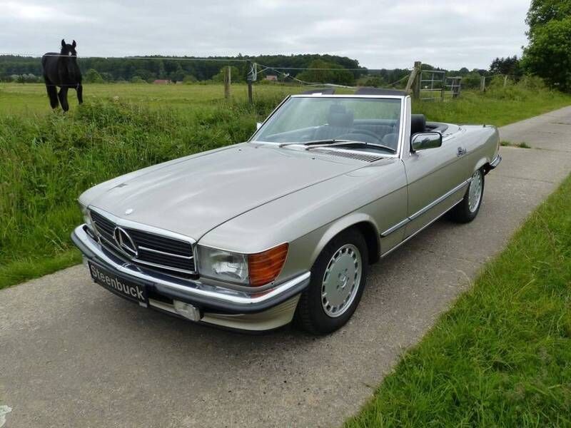 Zilversmoked silver metallic (mb 9720) Gebruikt 1986 Mercedes SL300 Cabriolet | € 82.500 - Afbeelding 1/4