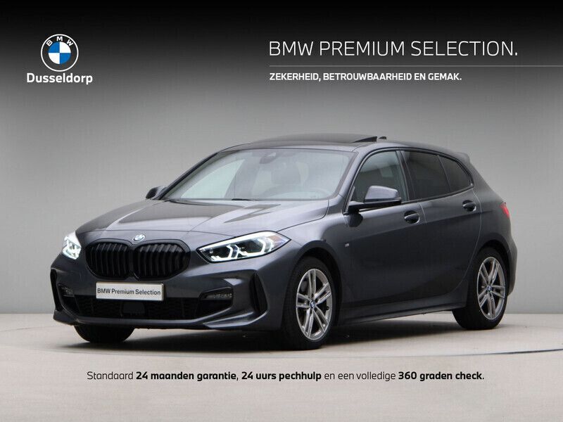 Grijs, metallic lak Gebruikt 2021 BMW 118 Executive Hatchback | € 27.495 (Eerlijke prijs) - Afbeelding 1/4