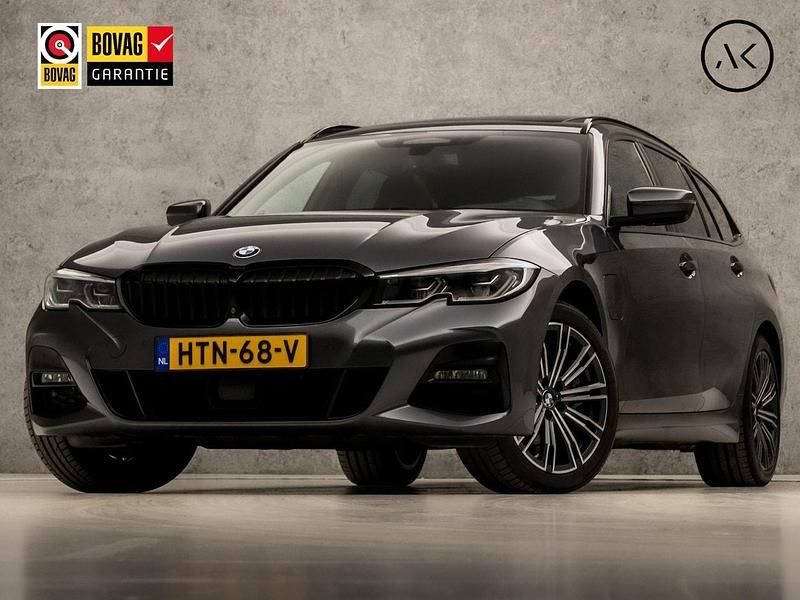 Grijs Gebruikt 2020 BMW 330e M Sport Stationwagen | € 28.945 (Eerlijke prijs) - Afbeelding 1/4