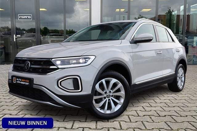Beige, metallic lak Gebruikt 2024 VW T-Roc Style SUV | € 32.450 (Goede deal) - Afbeelding 1/4