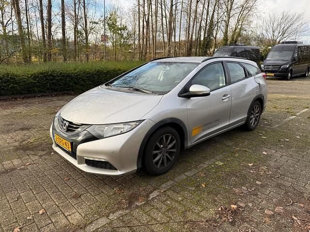 Grijs (metallic) Gebruikt 2015 Honda Civic Comfort Stationwagen | € 4.700 (Goede deal) - Afbeelding 1/4