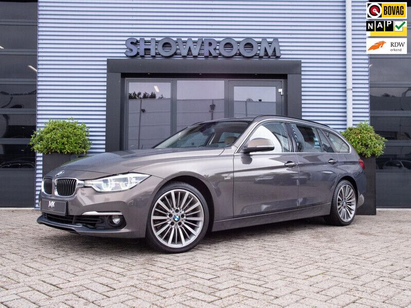 Grijs Gebruikt 2016 BMW 335 Executive Stationwagen | € 15.895 - Afbeelding 1/4