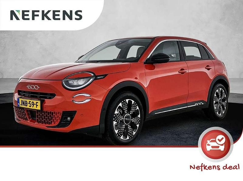 Oranje Occasion 2024 Fiat 600E La Prima SUV | € 26.400 (Eerlijke prijs) - Afbeelding 1/3