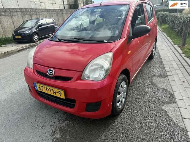 Rood Gebruikt 2011 Daihatsu Cuore Hatchback | € 799 (Eerlijke prijs) - Afbeelding 1/4