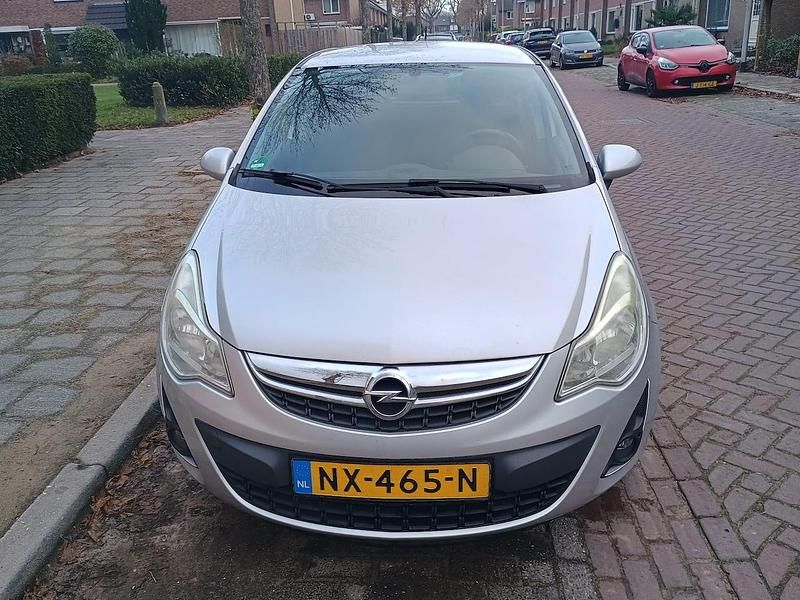 Grijs Gebruikt 2012 Opel Corsa Hatchback | € 3.300 (Super prijs) - Afbeelding 1/4