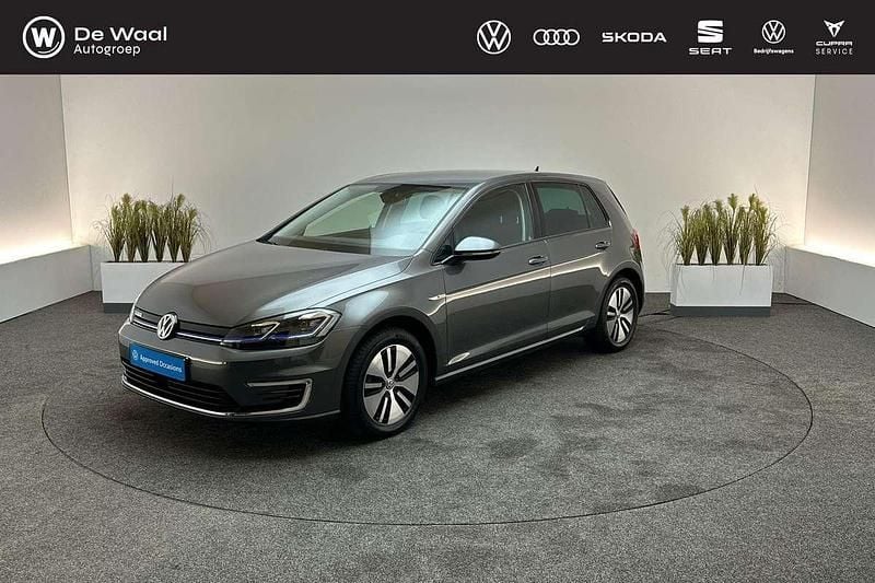 Indium grey metallic Gebruikt 2020 VW e-Golf Hatchback | € 13.395 (Goede deal) - Afbeelding 1/3