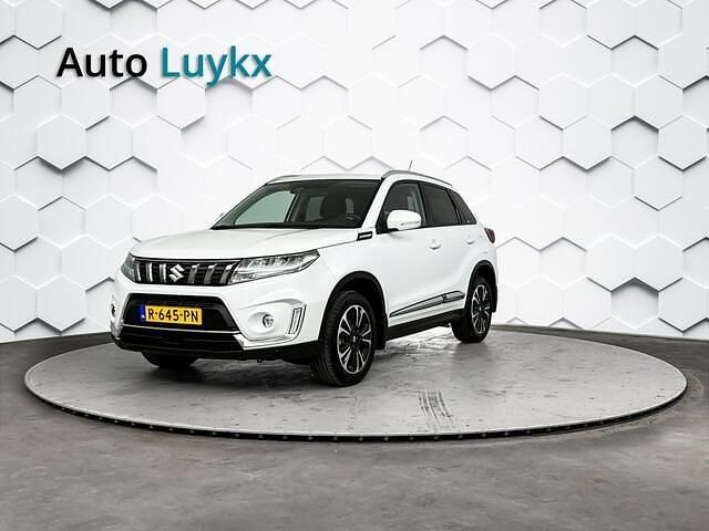 Wit (metallic) Gebruikt 2022 Suzuki Vitara Style SUV | € 23.940 (Goede deal) - Afbeelding 1/4