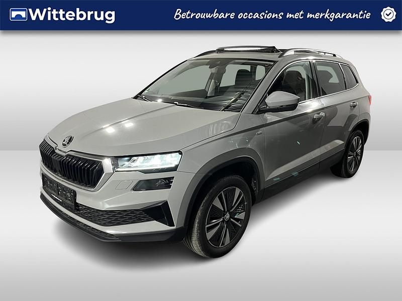 Grijs (metallic) Gebruikt 2022 Skoda Karoq Ambition SUV | € 26.950 (Duur) - Afbeelding 1/2