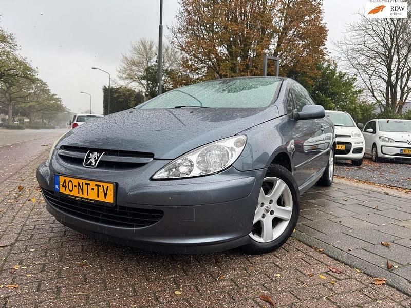 Grijs Gebruikt 2004 Peugeot 307 CC Cabriolet | € 995 (Eerlijke prijs) - Afbeelding 1/4