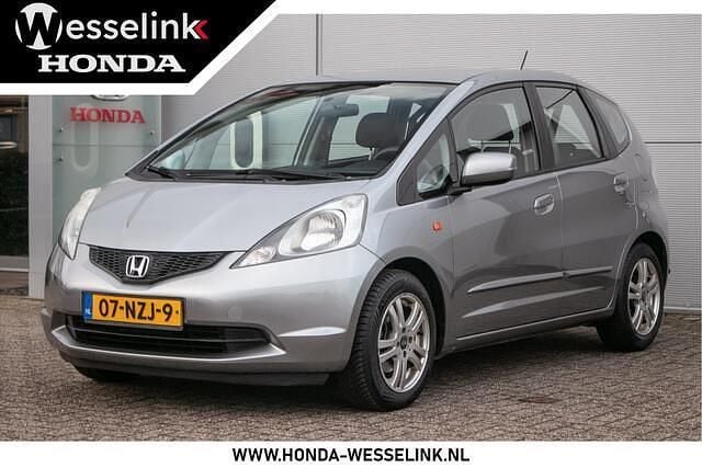 Grijs (metallic) Occasion 2011 Honda Jazz Cool Hatchback | € 5.950 (Eerlijke prijs) - Afbeelding 1/4