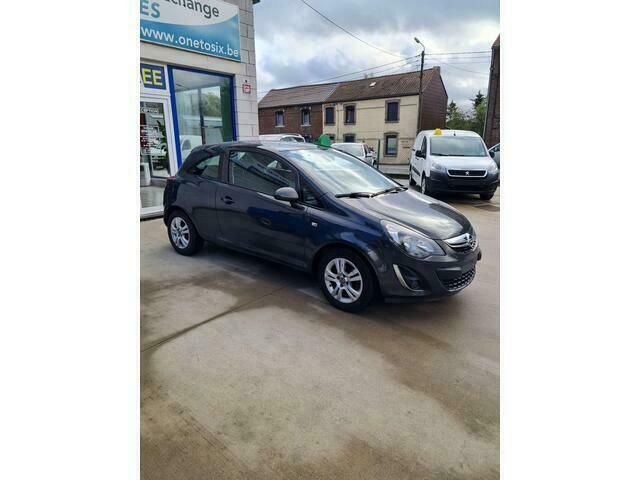 Grijs Gebruikt 2014 Opel Corsa Enjoy Sedan | € 5.500 (Eerlijke prijs) - Afbeelding 1/4