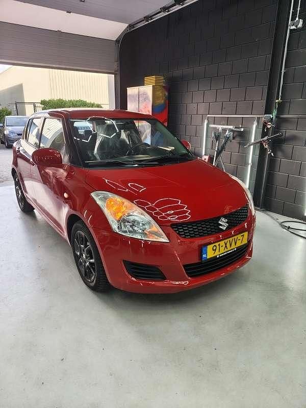 Rood Gebruikt 2012 Suzuki Swift Comfort Hatchback | € 6.950 (Goede deal) - Afbeelding 1/4