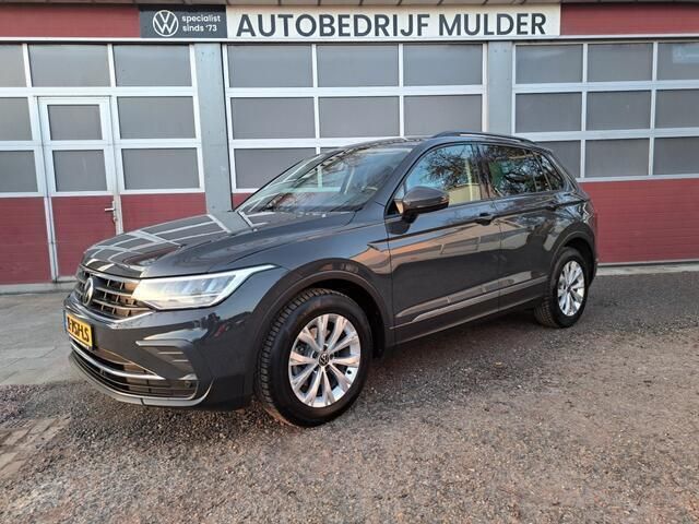 Grijs, metallic lak Gebruikt 2021 VW Tiguan Business SUV | € 25.450 (Super prijs) - Afbeelding 1/4