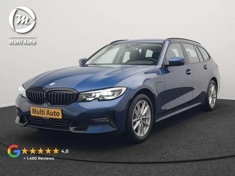 Blauw (metallic) Gebruikt 2021 BMW 330e Sport Line Stationwagen | € 28.840 (Super prijs) - Afbeelding 1/3